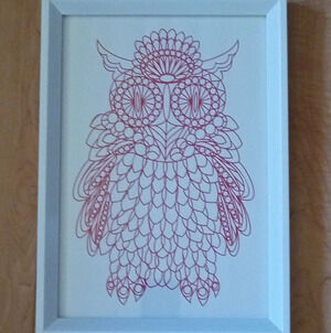 Geometric owl wall hanging in EUC